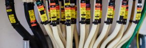 A close up of structured wiring cables in a business